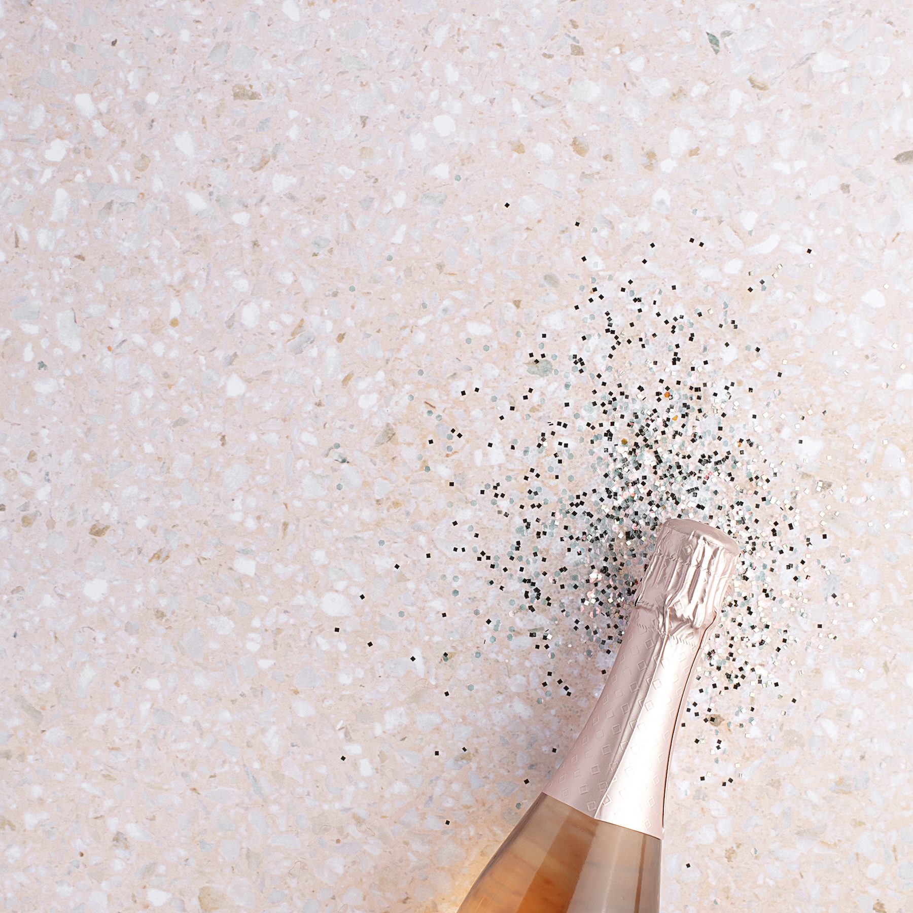 Rose Champagne with Silver Sparkles around the bottle