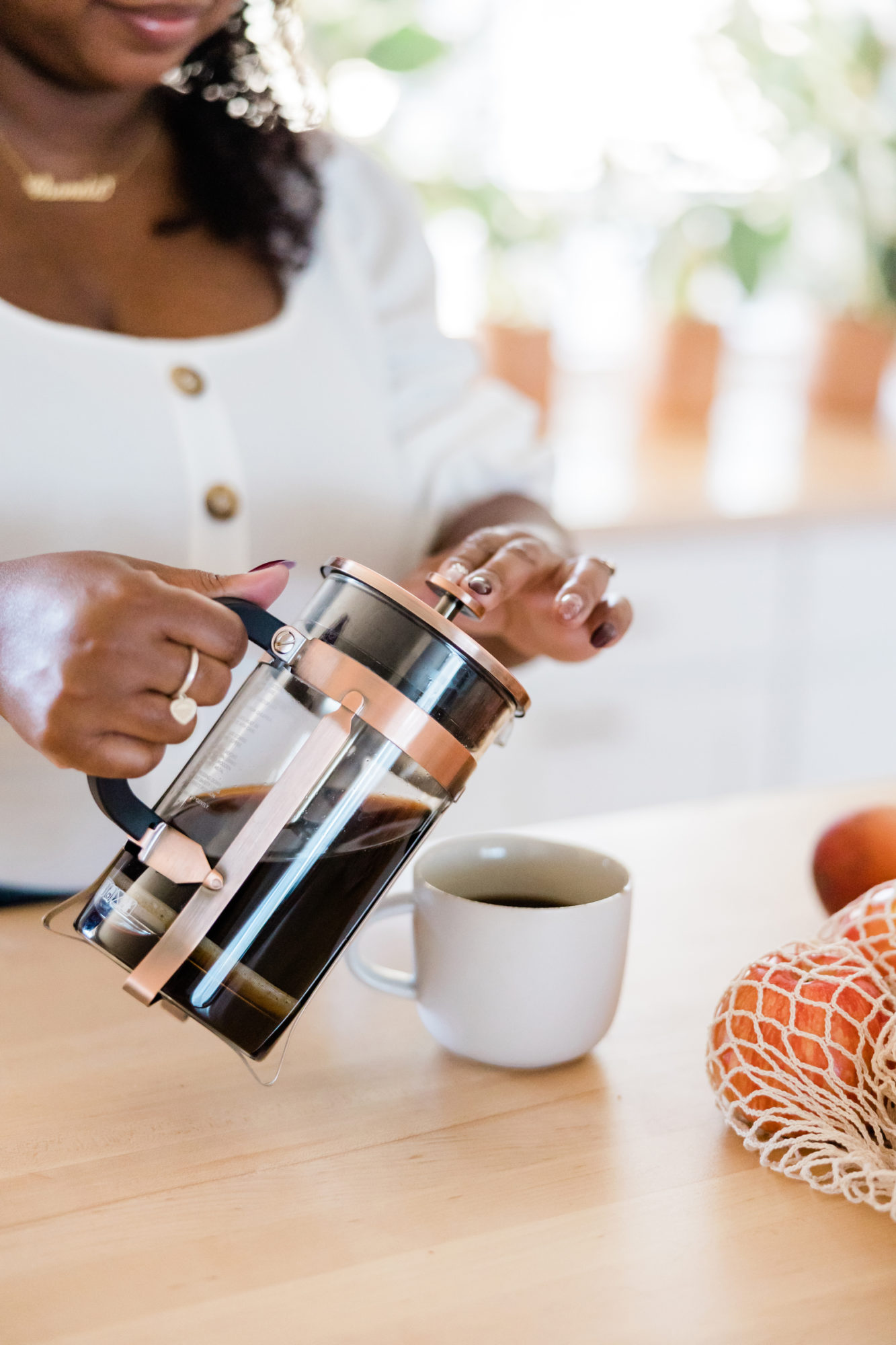 woman pouring coffee