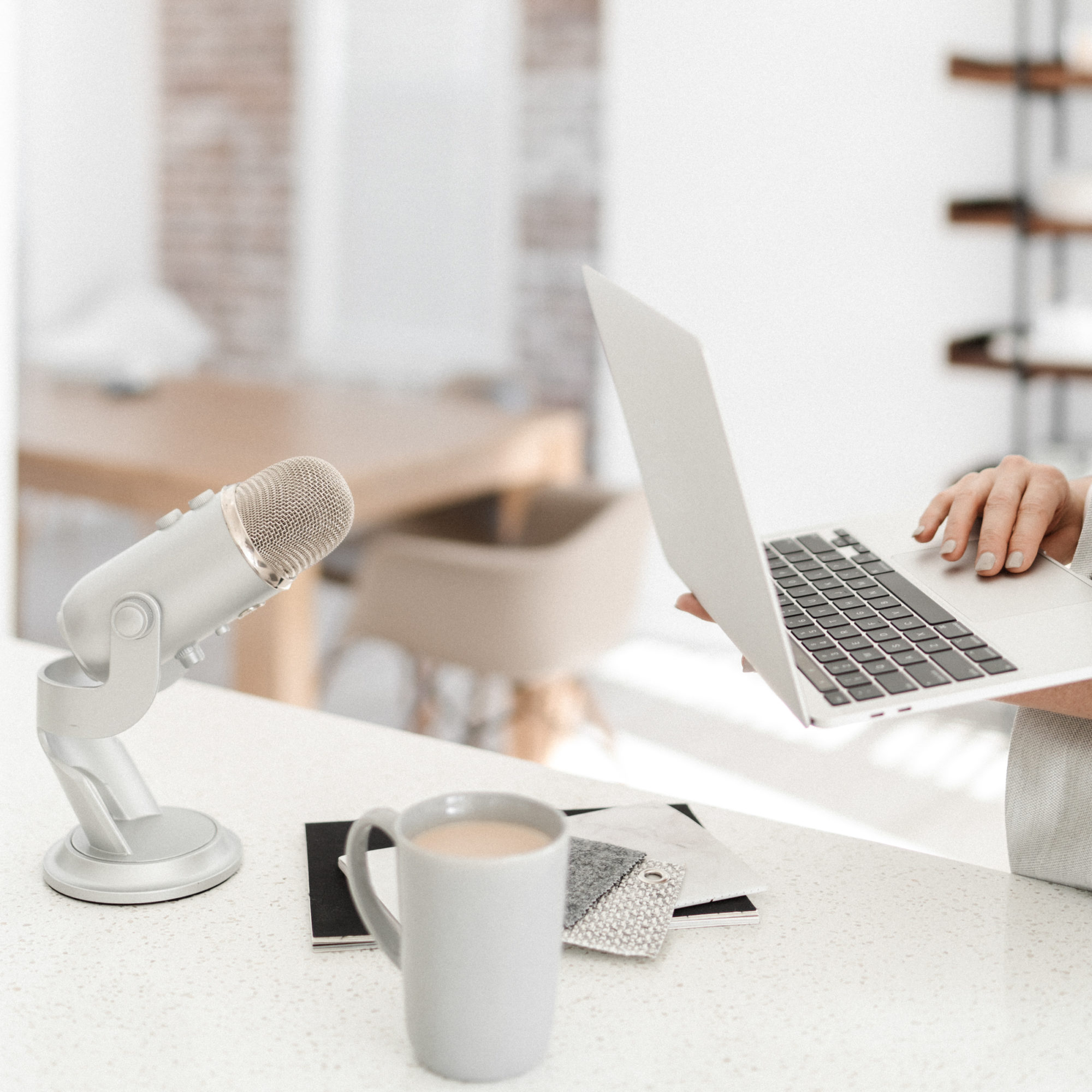 Woman holding laptop