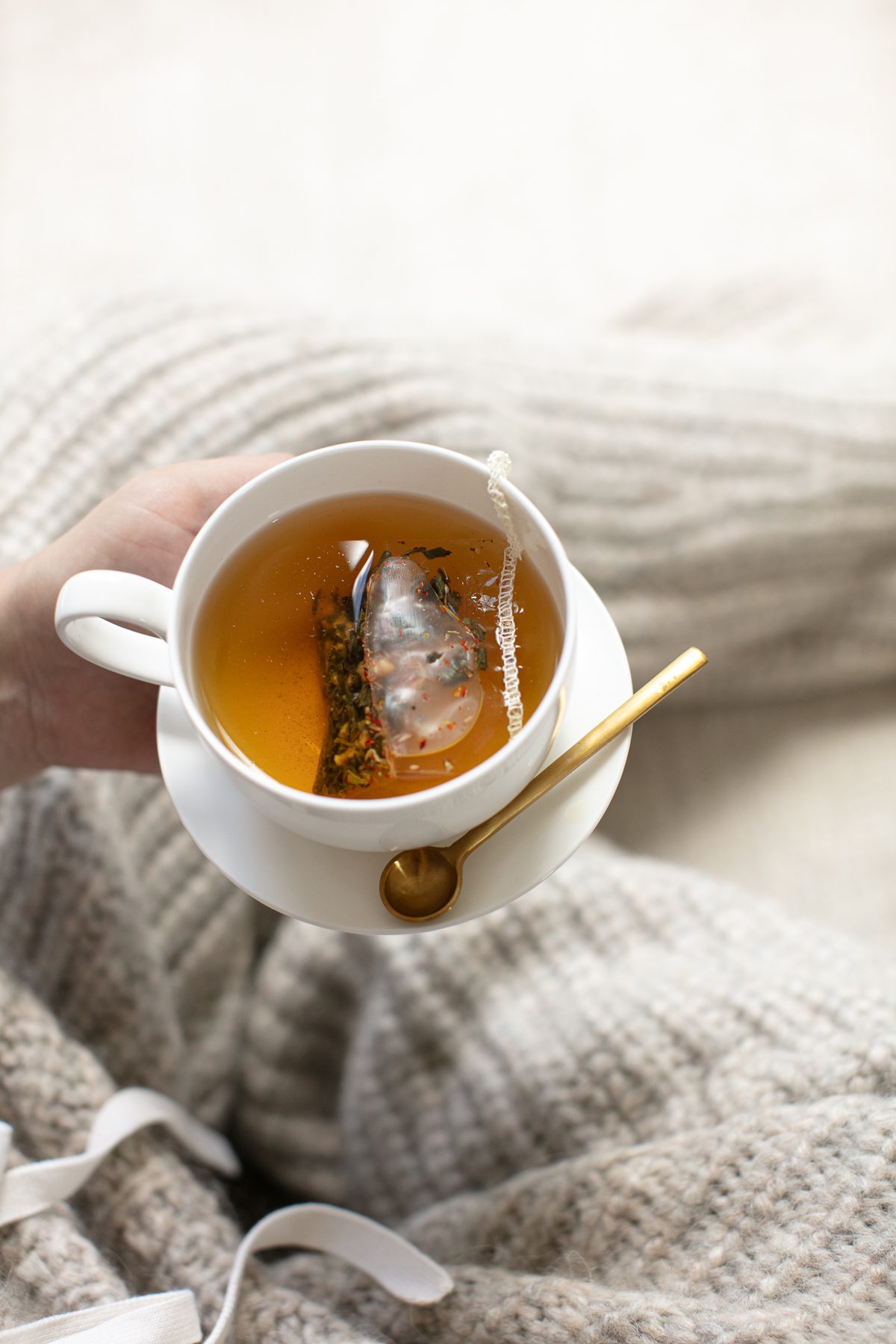 woman holding tea